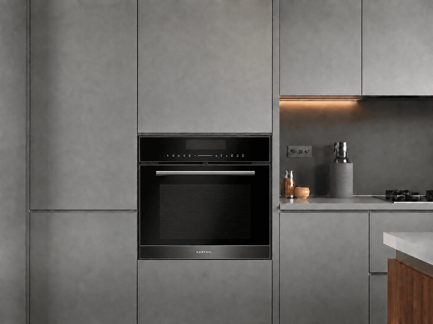 Carysil Linear built-in microwave in a pale stone kitchen